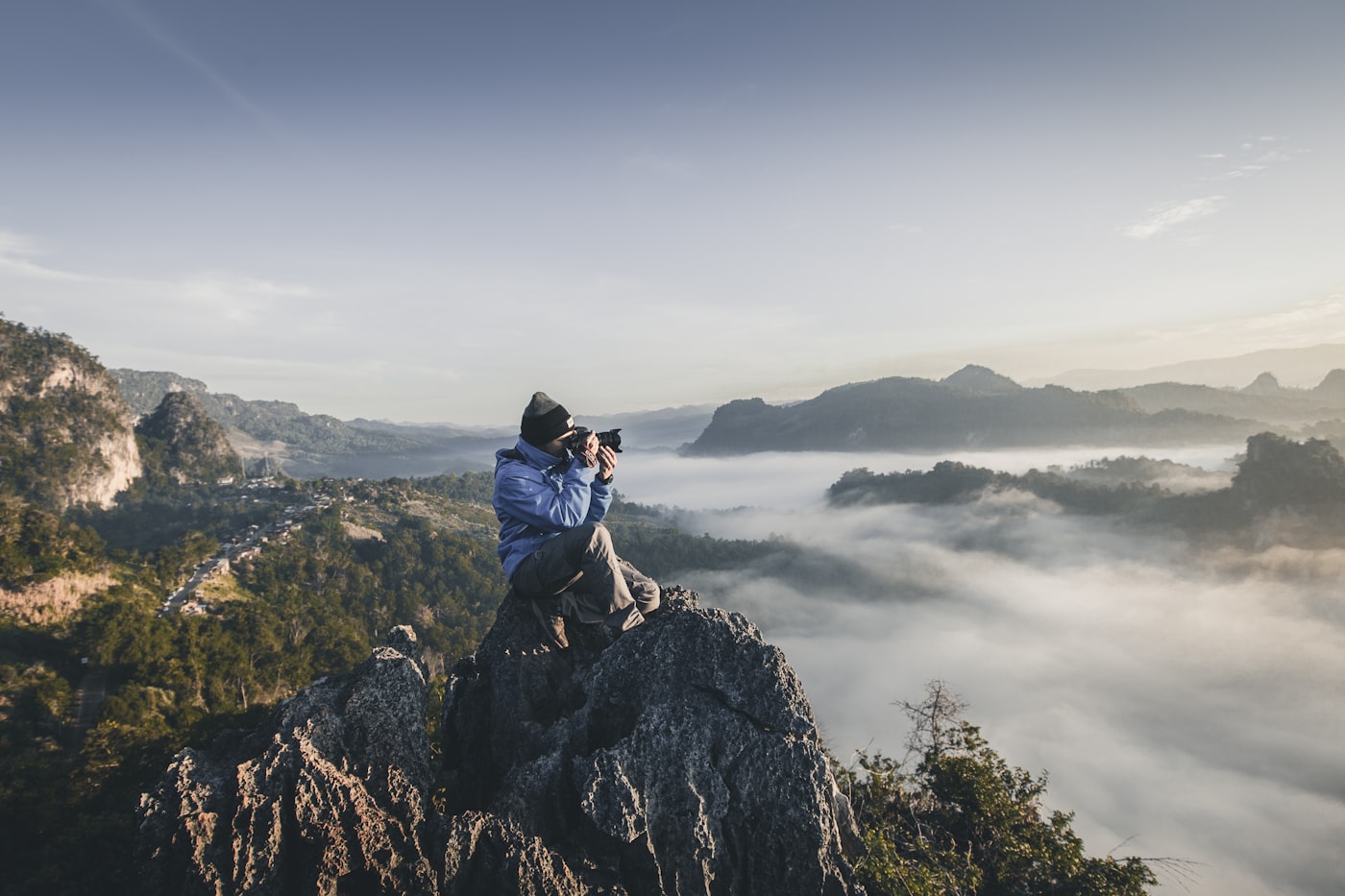 Content creator filming with a camera for YouTube growth